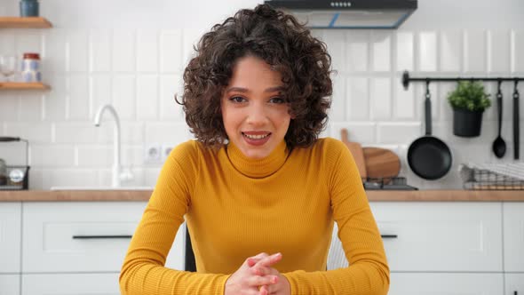 Smiling Hispanic Curly Woman Talking Listens Online Video Call Webcam Laptop alt