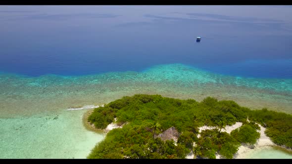Aerial top view tourism of paradise tourist beach adventure by turquoise ocean with white sandy back alt