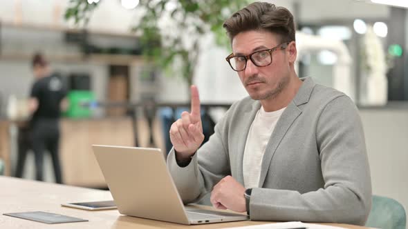 Middle Aged Man Having Online Payment Failure on Laptop alt