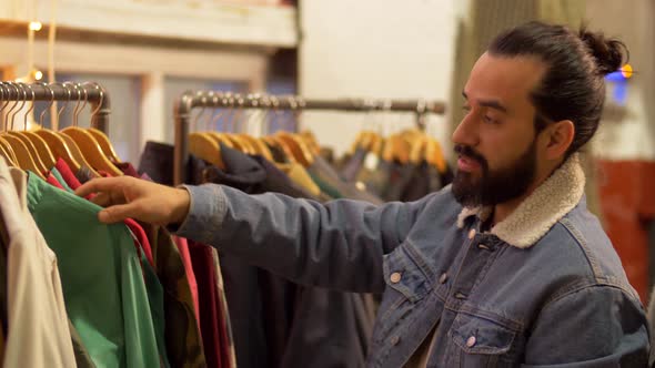 Couple Choosing Clothes at Vintage Clothing Store 30 alt