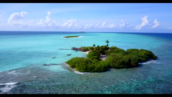 Aerial drone shot sky of paradise lagoon beach journey by blue green ocean and white sandy backgroun alt