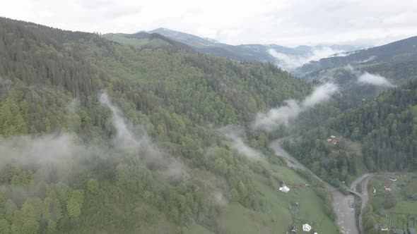 Landscape of the Carpathian Mountains. Slow Motion. Ukraine. Aerial. Gray, Flat alt