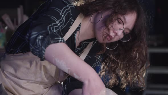 Pottery Crafting in the Art Studio  Woman Forming a Simple Pot Out of Clay Using Hands and Sponge alt