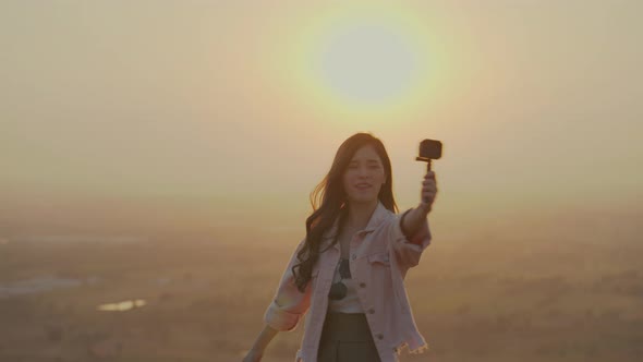 Asian young women travel blogger on mountain