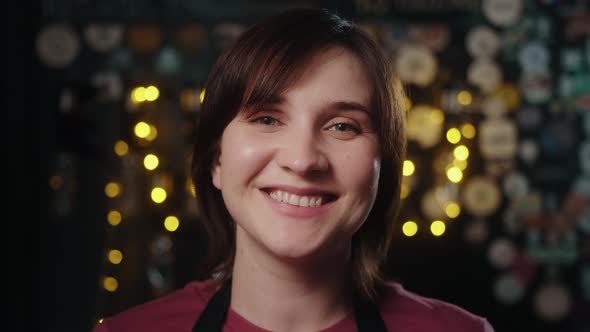 Portrait of owner woman cafe. Close up smiling face. Portrait of bar staff. Business. alt