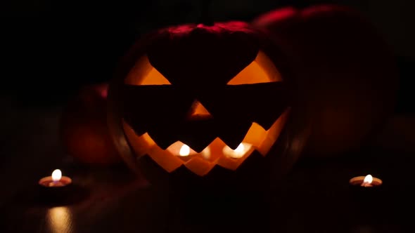 Halloween Jack-o-lantern Burning in Darkness  alt