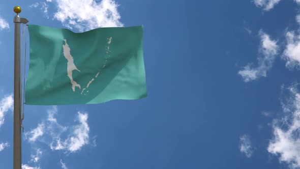 Sakhalin Oblast Flag (Russia) On Flagpole alt