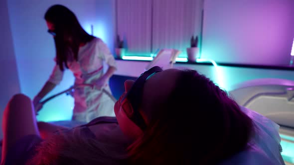 Closeup of a Young Woman Lying on a Laser Appeal Comfortably Positioned on a Couch Wearing alt