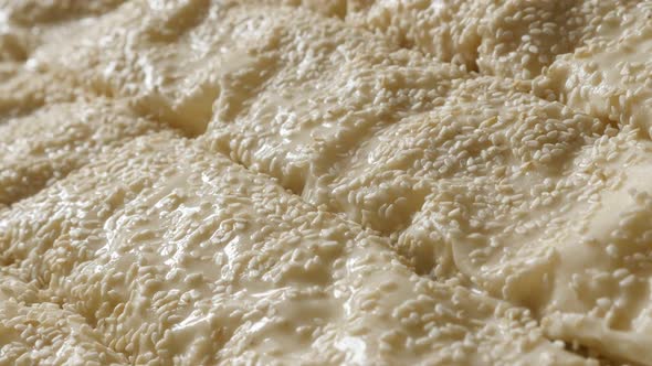 Rolled thin sheets of dough with filling ready for oven 4K 2160p 30fps UHD footage - Before baking f alt