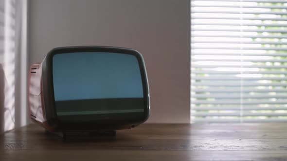 Vintage television displaying noise on the screen