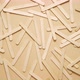 Wooden Popsicle Sticks Scattered on Top of a Beige Background - VideoHive Item for Sale