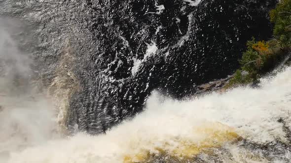 Looking Down A Very Big Waterfall As The Water Rushes To The Bottom Lake 2 alt