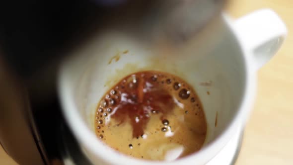 Espresso Coffee Machine Filling White Cup Overhead View Time Lapse