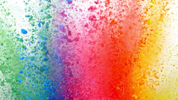 Super Slow Motion Shot of Color Powder Explosion Isolated on White Background at 1000Fps alt