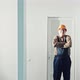 Portrait of a Man Construction Builder in Orange Helmet the Office Center - VideoHive Item for Sale