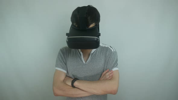 Guy Nods His Head In The Helmet Of Virtual Reality