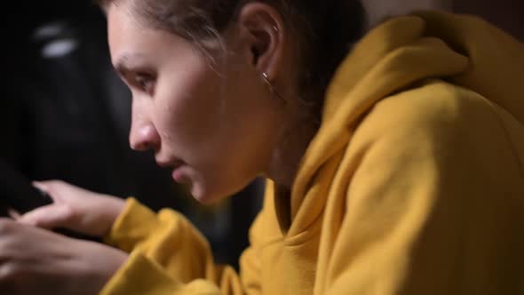 camera shows training young woman and goes to the burger that lies in front of the woman alt