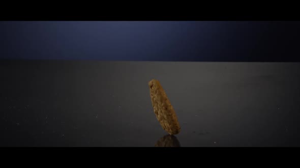 Falling cookies from above onto a reflective surface - COOKIES 251 alt