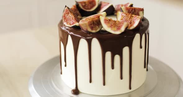 Caramel Cake or Cheesecake Garnished with Chocolate and Figs