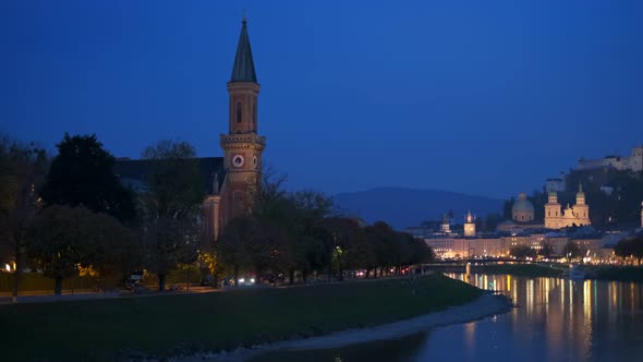 Salzburg City Evening View. Cathedral, Old Town Altstadt, Church, Hohensalzburg, Castle Illuminated alt