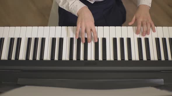 Little Girl Playing the Piano alt