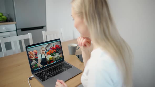 Woman on Selfisolation Chooses Flowers As a Gift Online the Process of Making a Gift Purchase Using alt