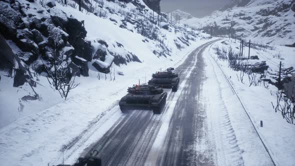 A Military Convoy With Tanks