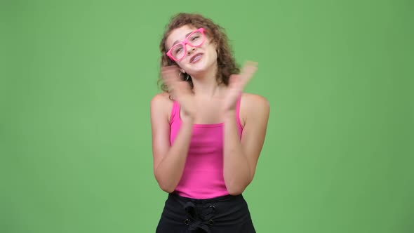 Young Happy Beautiful Nerd Woman Clapping Hands alt