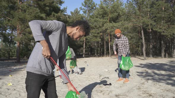 Group of 4 Friends Volunteering Together