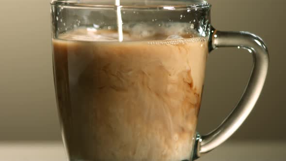 Milk poured into coffee in ultra slow motion 1500fps - COFFEE w MILK PHANTOM  alt