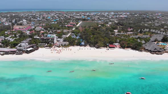 Aerial Paradise Sandy Beach with Turquoise Ocean and Luxury Hotels in Zanzibar alt