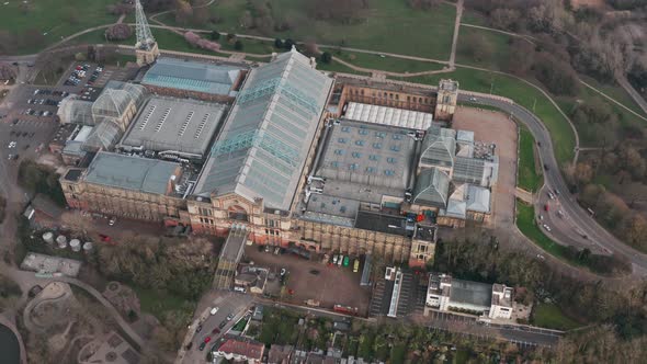 Dolly back pan up aerial shot of alexandra palace alt