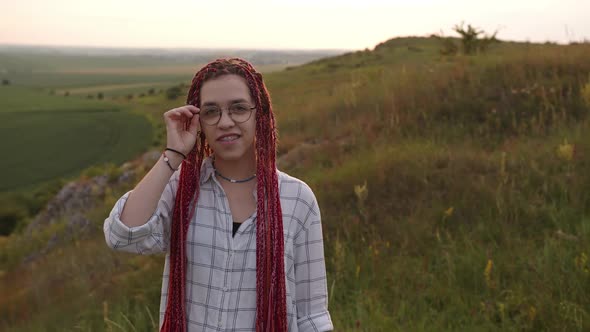 Close Up View of a Girl That Smiling on the Camera alt