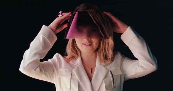 Portrait Smiling Woman Raising Face Shield Up Looking Straight to Camera Footage alt