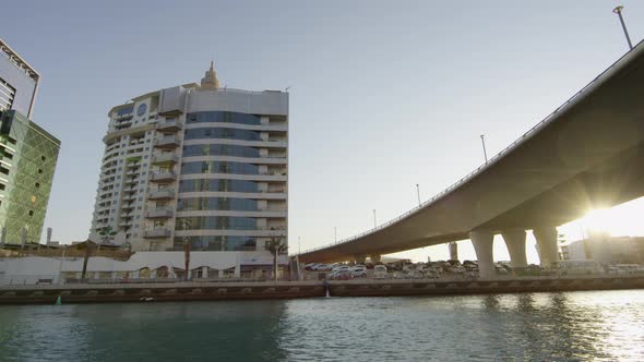 Modern buildings and a bridge in Dubai alt