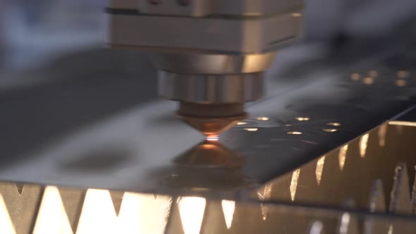 Industrial Plasma Cutter Machine Cuts a Sheet of Metal, Pierces Thin Lines at High Speed