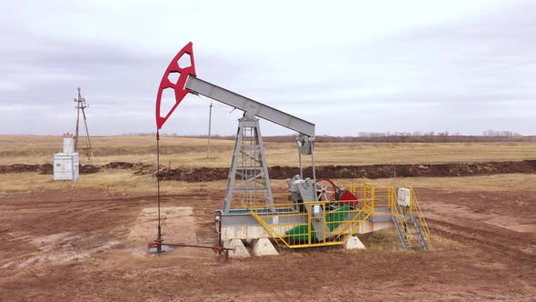 Pump Jack in Vast Oil Fields in Russia alt