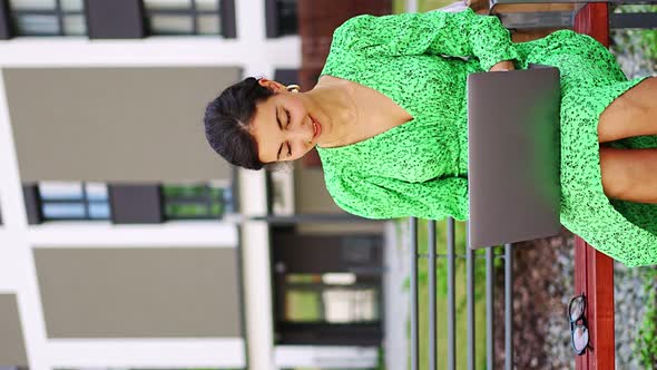 Caucasian Woman Working with Laptop Computer Outside Office alt