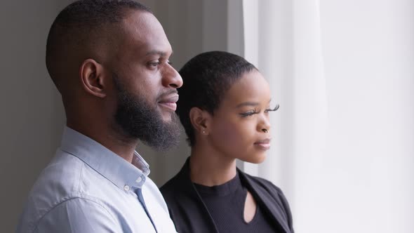 African Married Couple Colleagues Black Businesswoman with Long Eyelashes and Ethnic Businessman alt