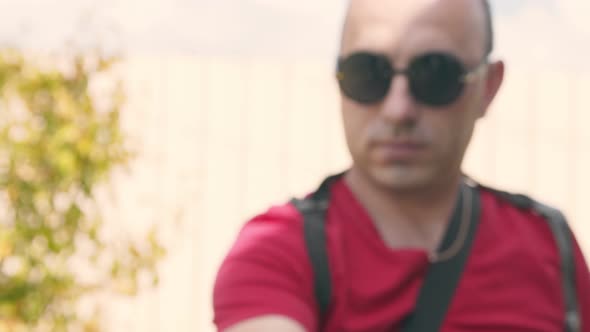 A Man Who Raises a Gun and Aims in Front of Him. One Second Before the Shot. A Man Tries To Shoot alt