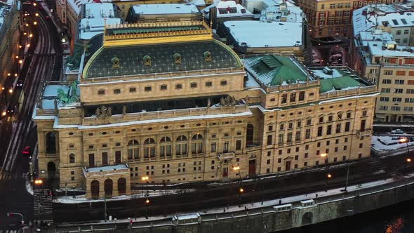 Prague, Czech Republic. Aerial View, National Theatre Building on Winter Evening and Street Traffic alt