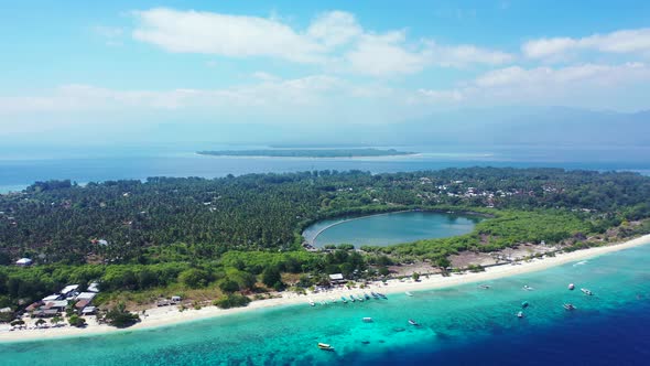 Wide angle drone copy space shot of a white sand paradise beach and aqua turquoise water background  alt