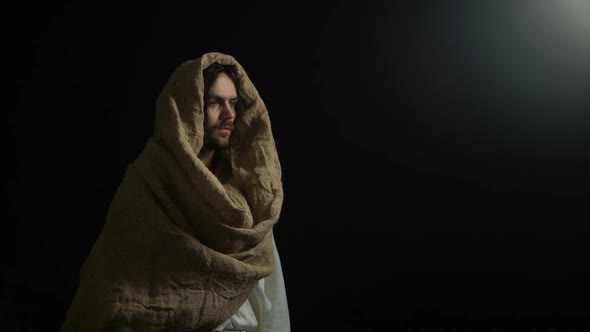 Jesus in Robe Coming Out of Darkness and Raising Hands, Appeal to God, Faith alt