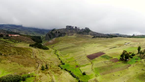 Aqueduct At The Foot Of The Green Hill With A View Of  Stone Forest In Cumbemayo In Peru. aerial alt