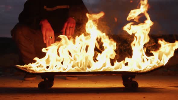 Skateboard on fire alt