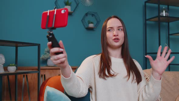 Girl Blogger Influencer Taking Selfie on Smartphone Make Virtual Social Media Video Online at Home alt