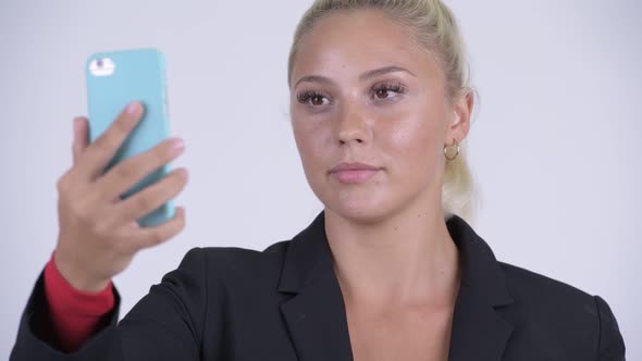 Face of Houng Happy Blonde Businesswoman Using Phone alt