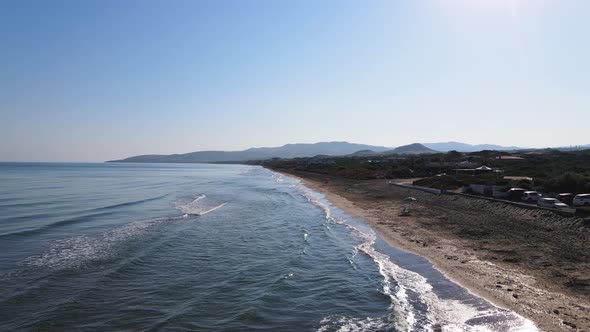 Stunning aerial drone view of Sardinia coastilne bathed by a turquoise and transparent sea alt