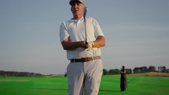 Golf Player Enjoy Hobby on Green Course alt