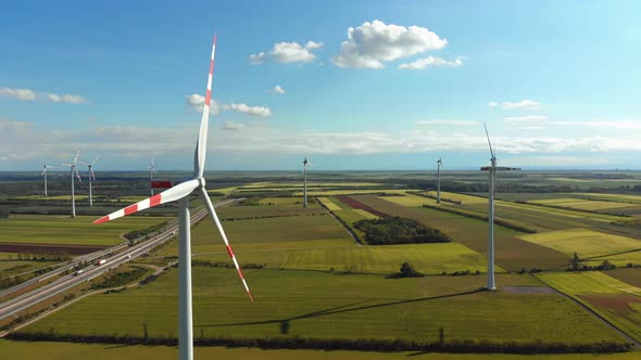 Aerial View of Wind Turbines Farm in Field. Austria. Drone View on Energy Production alt
